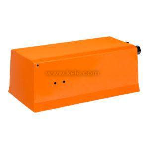 Orange rectangular metal cover with slanted top and two small holes on side