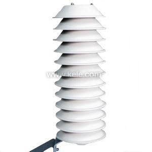 Cylindrical outdoor sensor shield composed of stacked white discs with spaces between them to allow air flow while shielding from sun.