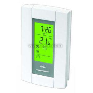 White rectangular wall thermostat with a tall green-lit screen showing 7:26 and 21.5°C along with icons.