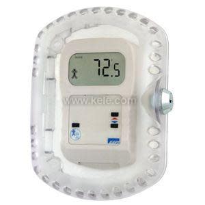 Transparent plastic box enclosing a wall thermostat with lock.