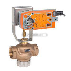 Large brass valve with a round body and an attached orange actuator on top