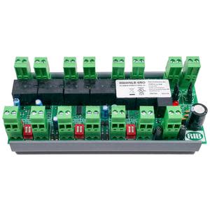 Rectangular circuit board with rows of green terminal blocks and central black relay module.
