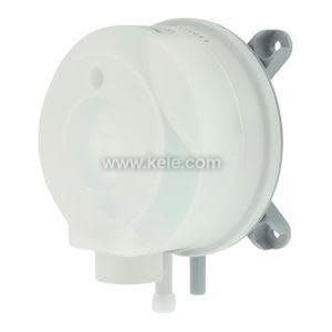 Round pressure switch with setpoint dial.