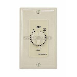 A beige wall switch timer with a rotary knob showing numbers up to four hours and an off position at the top.