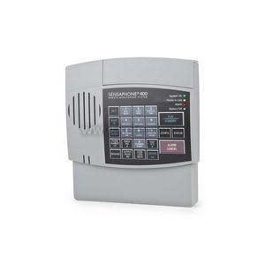 Grey remote alarm dialer with keypad and speaker.
