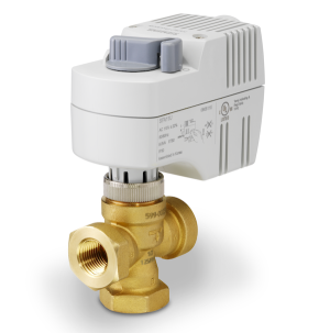 Gold-colored T-shaped valve body with three threaded openings topped by a white plastic actuator housing with a grey manual knob.