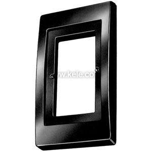 Black rectangular wall plate frame with central opening and two screw holes.