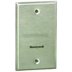 Rectangular satin stainless faceplate with two recessed mounting screws and small Honeywell wordmark centered.
