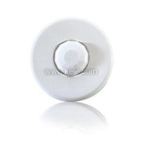 Round white ceiling sensor with faceted lens cover