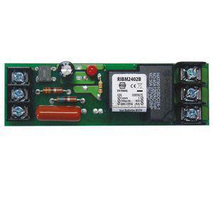 Narrow rectangular printed circuit board with terminal connectors, a white relay module, and various small electronic parts