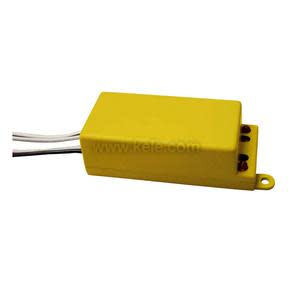Small yellow plastic enclosure with a mounting hole and a pair of wires protruding from one end
