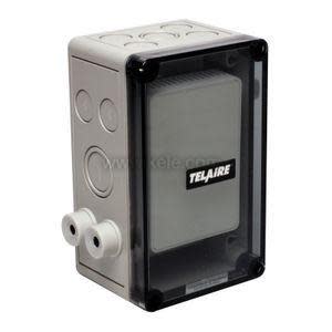 Rectangular grey transmitter housing with clear window showing electronics and label