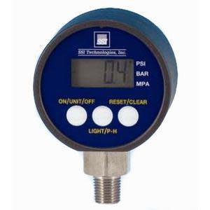 A circular electronic gauge with a small screen showing numbers and four buttons below, attached to a threaded metal connector.