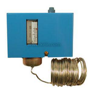 Blue rectangular temperature controller with a small circular gauge window and a coiled copper capillary tube attached.