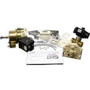 Collection of mechanical and electrical parts such as a motor, valve body, electronic boards, and paperwork.