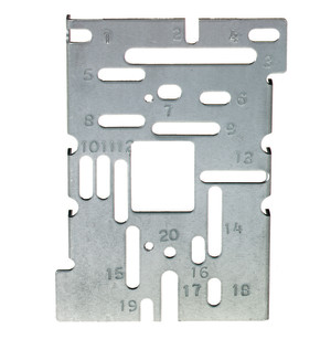 A flat silver-colored metal plate perforated with multiple slots and holes, each labeled with a number for aligning different mounting configurations.
