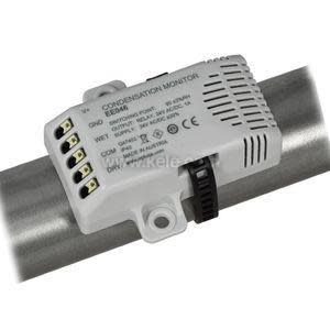 Small rectangular device with black strap and clamp encircling a pipe.