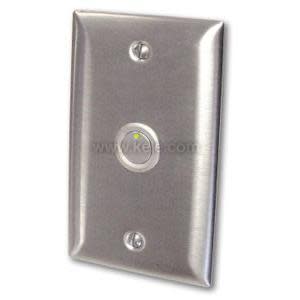 A brushed metal single‑gang wall plate featuring a small round illuminated button in the center, with two screw holes above and below.
