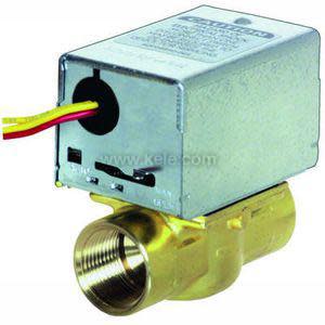 Picture shows a cube-shaped metal actuator mounted on a brass valve body; two colored wires exit through a round grommet for electrical connection.