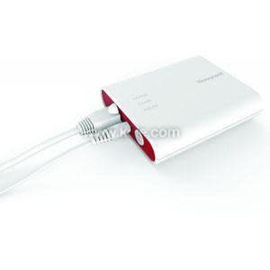 White rectangular network module with red end panels and two cables plugged into one side