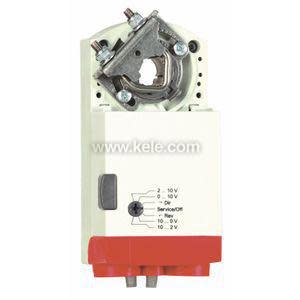 Rectangular actuator with a circular clamp mechanism at top, red base and voltage selection diagram on front