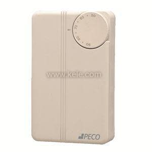 Beige thermostat featuring a round dial covered by a clear window