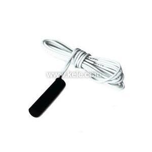 Black probe on coiled white wire for remote temperature sensing.