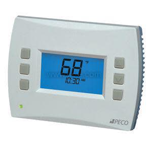 Grey rectangular wall thermostat with blue display and three triangular buttons