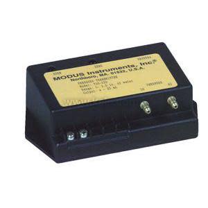 Black trapezoidal module with yellow identification label and pressure ports.