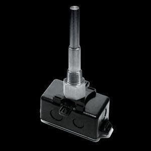 Small black box with a metal tube sticking straight up from the top, threaded at the base for securing.