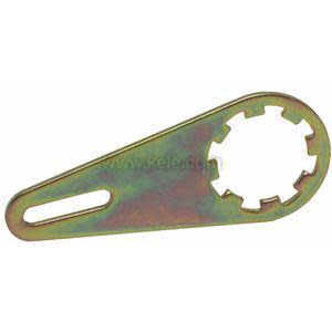 Flat metallic wrench shaped like a lever with a circular gear-like opening on one end and a long oval slot on the other, isolated on white.
