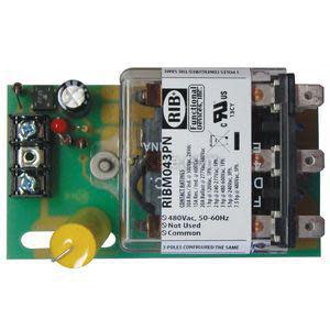 An electronic control module consisting of a green circuit board with a transparent relay housing, capacitors, and various connectors.