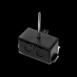 Small black box with a single vertical metal probe protruding from the top and mounting ears