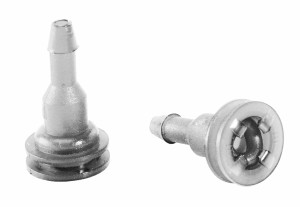 Close-up of two small cylindrical fittings, each with a barbed tip for attaching flexible tubing and a circular base for securing the connection.