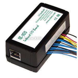 Rectangular black electronics module labeled IB-100 with an Ethernet jack on one end and a bundle of colored wires coming out the other.