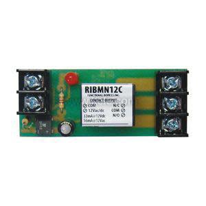 Small green circuit board with a white component marked RIBM12C and six connection screws, plus a tiny red light.