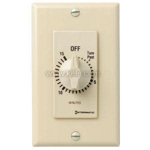 A light tan wall plate containing a dial that rotates through a 15-minute scale with off at the top.