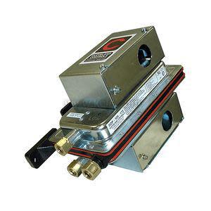 Two grey metallic canisters joined side by side with a small black lever across them.