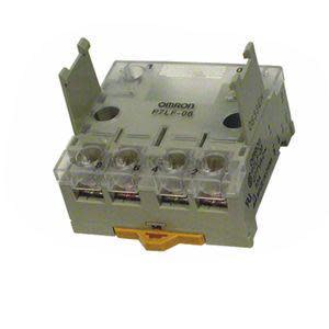 Grey cube‑shaped relay socket with clear numbered terminal blocks and a small orange clip at the bottom