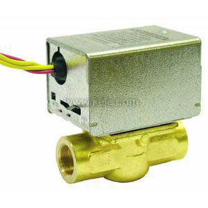 Brass inline valve supporting a small metal box actuator on top with colored wires emerging from one side.