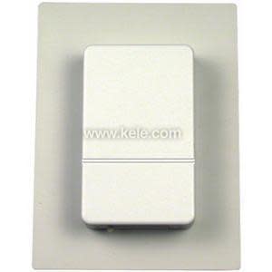 White rectangular sensor box mounted on a wall plate.