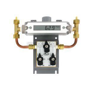 Differential pressure transmitter with orange LCD and copper tubes.