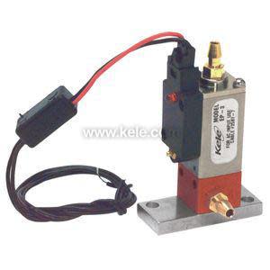 Solenoid valve assembly with coil, brass fittings and base plate.