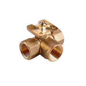 Gold-colored valve with three threaded openings and a flat platform on top for attaching an actuator.