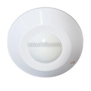 Round white motion sensor with a central dome lens.