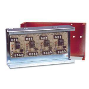 Rectangular metal panel with three relays and rows of screw terminals; comes with a red protective cover
