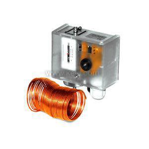 Long freeze-stat device with clear housing and coiled copper tubing sensor.