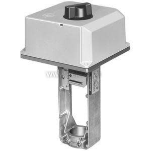 Square grey actuator with round black knob on top, attached to an open metal yoke for valve stem