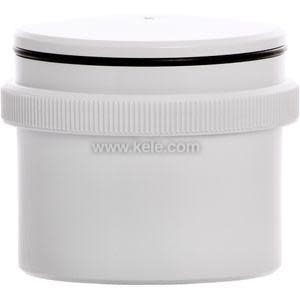 Short white cylindrical module with smooth sides and top