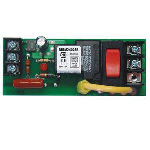 Small green circuit board with a red rectangular coil and a white relay, plus several screws for wire connections.